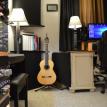 rude guitar studio rack and classical guitar